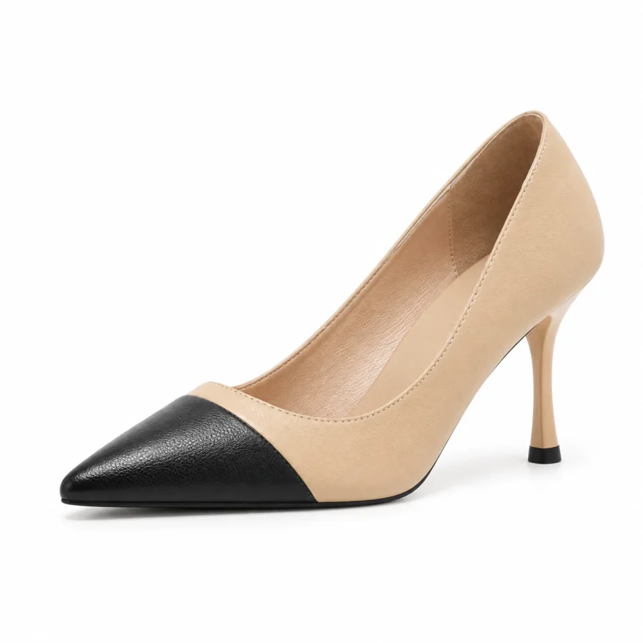Beige and black cap-toe pointed heels for women in US size 4 on a white background